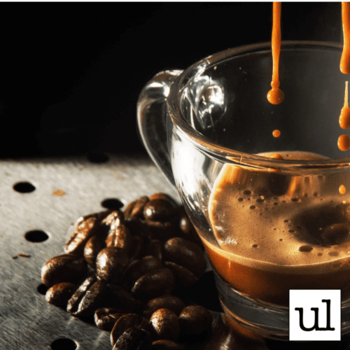 espresso dripping into a mug
